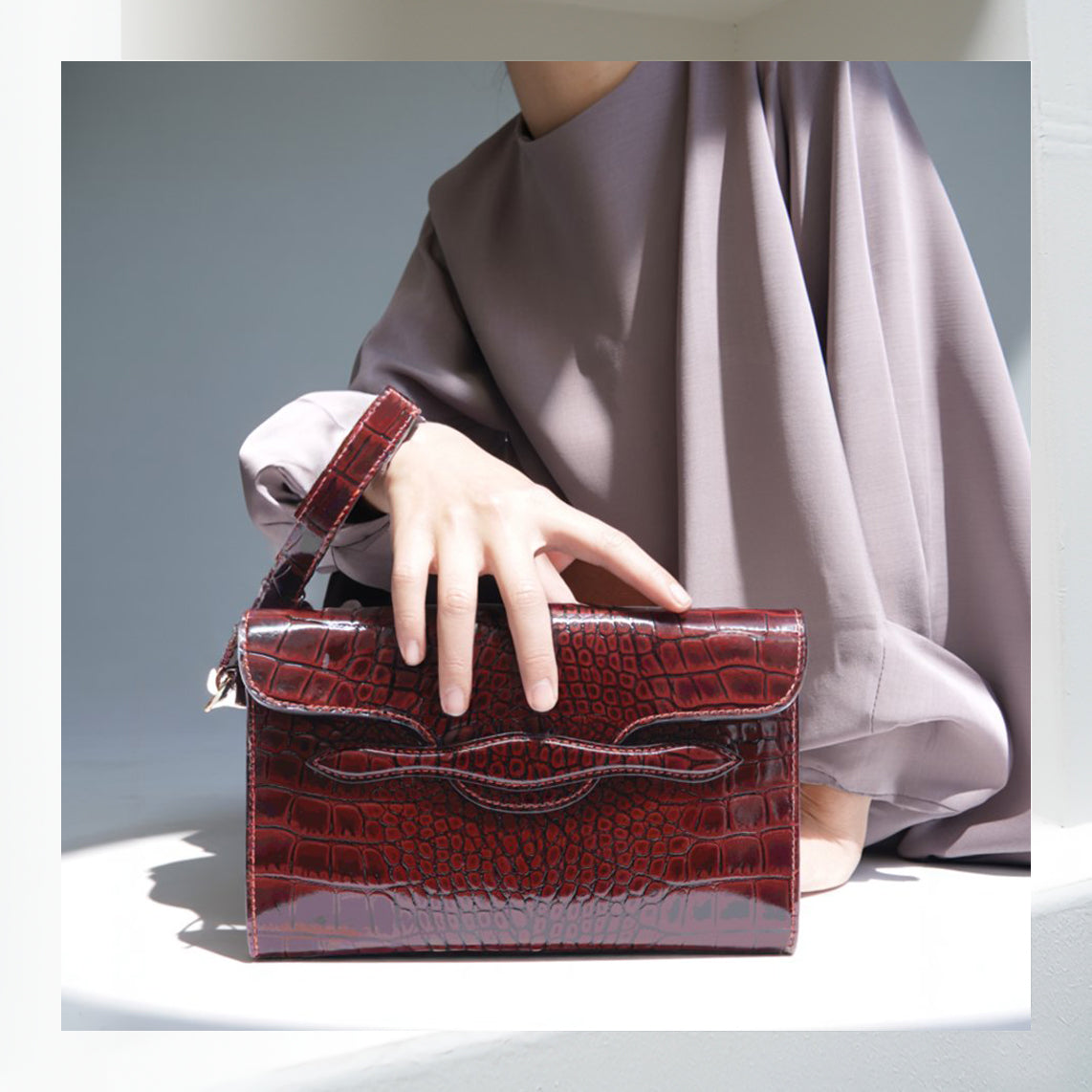 The Juman clutch - Maroon croco leather